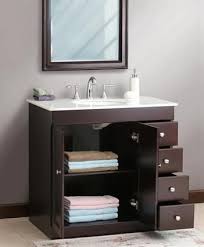 Bathroom renovated with mosaic of grey tiles. Small Bathroom Solutions Storage Smart Bathroom Vanities Small Bathroom Vanities Small Bathroom Solutions Bathroom Sink Vanity Modern
