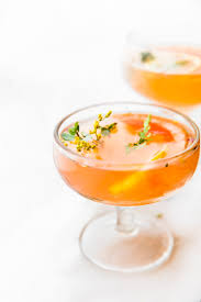 This simple mixed drink includes tequila, orange juice, and grenadine. Light Palmoa Cocktail With Oranges