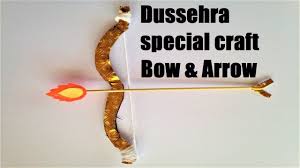 With your free hand, take your duct tape and wrap it around the arrowhead and arrow, connecting the two together firmly. In This Video We Show You How To Bow And Arrow Making With Cardboard For Kids At Home Easily Dussehra Festi In 2021 Arrow Crafts Dussehra Craft For Kids Arrow Craft