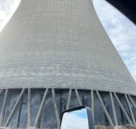 Cooling towers at nuclear power plants are open at the ...