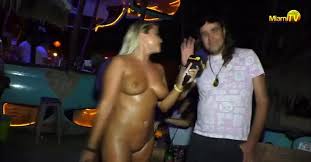 Miami TV presenter doing her show wearing a chain