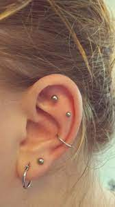 Would Be Nice To Have That Conch Make Perpanent First The Other Ear Must Heal Though Piercings Cute Ear Piercings Ear Piercings