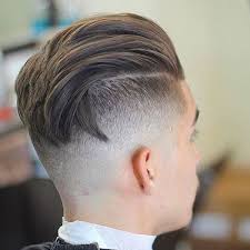 High Undercut Fade With Textured Slicked Back Hair Mens Hairstyles Undercut Undercut Hairstyles Long Hair Styles Men