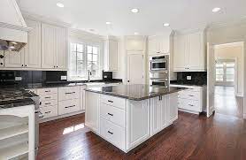 Kitchen With White Cabinets And Black Granite Countertops With Wood Refacing Kitchen Cabinets Cost White Cabinets Black Countertops Off White Kitchen Cabinets