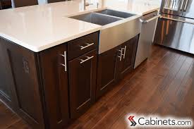 A Modern Application Of Espresso Stained Cabinets The Simple Hardware And Clean White Countertops Are T Espresso Cabinets Modern Kitchen Design Home Kitchens