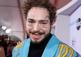 Rita Ora shows off beard and face tattoo as she dresses up as Post Malone  for Halloween