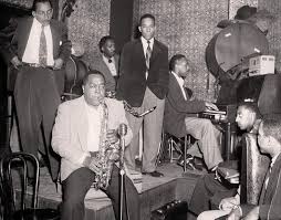 Charlie Parker with Joe Newman, and Lou Donaldson at Smalls Paradise in  Harlem, New York City, 1953 or 1954. : r/Jazz