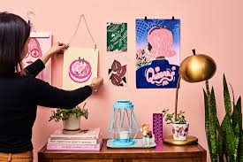 This streamlines your walls and doesn't put too much strain on the eyes. How To Hang A Poster Best Diy Ways To Hang Unframed Posters On Walls Apartment Therapy