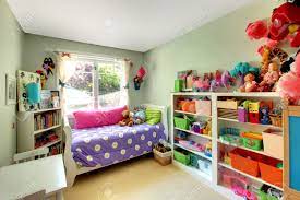 Maybe you would like to learn more about one of these? Kids Bedroom With Green Walls And Purple Bed And May Toys Stock Photo Picture And Royalty Free Image Image 12621259