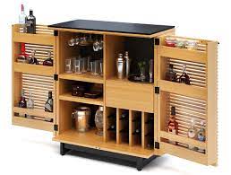 Here in this post, i've an enjoyable assortment of compact bar design ideas concept to to share. Corridor Compact Bar Swanky Cabinet To Flaunt Your Wine Collection In Style Homecrux