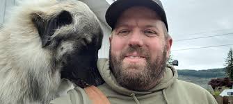 Do dogs grow out of nibbing/cobbing (biting with front teeth) as a way of  showing affection?