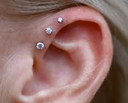 The style is timeless, unique and suits any gender or age. Triple Forward Helix Piercing Explore Tumblr Posts And Blogs Tumgir