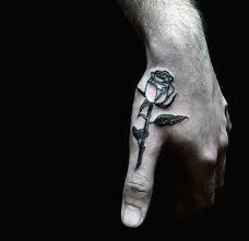 Top 63 Little Hand Tattoo Ideas 2020 Inspiration Guide Small Hand Tattoos Hand Tattoos For Guys Men Flower Tattoo