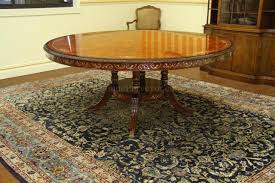 This elegant and round dining set will enhance the beauty of your dining room. 72 Inch Round Walnut Dining Table With Lazy Susan For Sale
