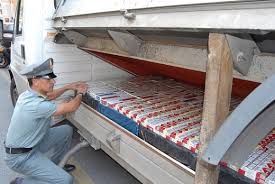 Look in the left leg of the please correct this egg if you see errors. Cigarette Smuggling Still Booming