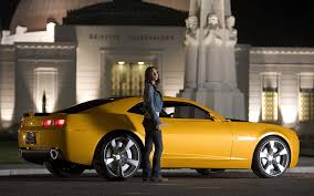 Fans of the transformers movies and the new camaro car can now be driving a bumble bee camaro for real. Bumblebee Camaro In Transformers 4 Transformers Camaro Bumblebee Hd Wallpaper Wallpaperbetter