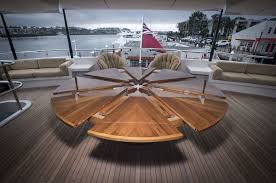 The Finished Product In Action Our 80 Teak Expanding Round Table Installed On The Deck Of Its New Yacht Expanding Round Table Adjustable Height Table Table