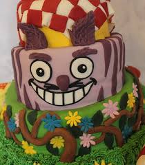 The top tier is carrot with orange cream cheese filling. Wonky Alice In Wonderland Birthday Cake Pauls Creative Cakes Flickr
