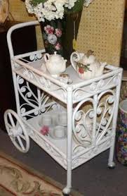 Wrap utensils into pastel napkins, use stacks of books with pastel cups, pearls and flowers for decorating the blooms will never go out of style and decorating your bar or tea cart with them is a brilliant idea. 49 Tea Cart Ideas Tea Cart Vintage Tea Cart Tea Trolley