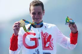 Alistair carrying jonny over the line at the triathlon world series last year definite. Alistair Brownlee Suspends Bid For Third Olympic Gold To Pursue Dream Of Winning Ironman Events Irish Mirror Online