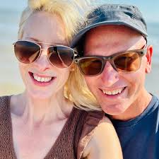 What exterior paint colors and garage door colors match a dark stained  front door