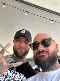 Who is the person with a beard?