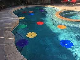 These Solar Panel Flowers Heat Up Your Pool By Absorbing Sunlight So Your Pool Is Always Warm In 2020 Pool Warmer Solar Flower Pool