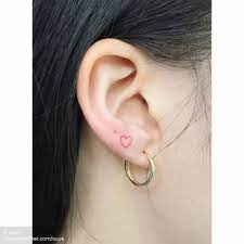 Conventional Red Heart On The Ear Small Face Tattoos Red Ink Tattoos Red Heart Tattoos