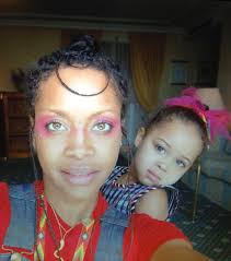 Erykah Badu and a baby Puma ✨✨