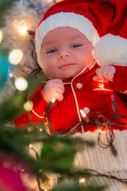 Briar, This is your first Christmas, though you won't remember the lights  or the way they tremble in your hands. You are new to everything to warmth,  to color, to the quiet