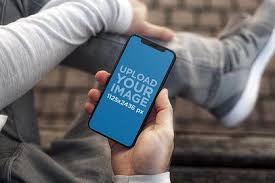 Download Placeit Mockup Of A Young Man Holding An Iphone 11 Pro Mockup Generator Mockup App Design