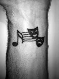 If you're a huge admirer of music and want to show it this is a simple piece that incorporates several design elements into an interesting and personal tattoo. Top 43 Simple Music Tattoos For Men 2021 Inspiration Guide
