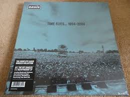 A box set featuring postcards of the sleeves of every uk oasis single was released concurrently with the album. Gripsweat Oasis Time Flies 1994 2009 Uk 2010 Sealed Vinyl Box Set Mint