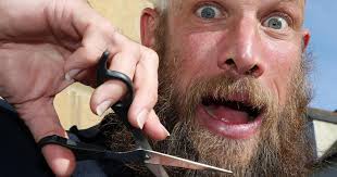 Close shave gives postman Dan 'strange' new look