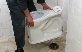 If you're installing a new floor, pedestal sink, and toilet, you should install the laminate flooring first so it's under the sink and toilet. Install A Toilet Fine Homebuilding
