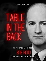 Table in the Back: Warden Bob Hood (TV Mini Series)