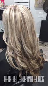 Lowlights give a great opportunity to start a romance with a darker tone for those who have been devoted to blond for years. Ash Blonde Highlights With Chocolate Brown Lowlights And Under Color Blonde Hair Color Ash Blonde Highlights Blonde Highlights