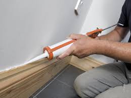 Clean the damaged area with a stiff brush to remove any loose paint or rotted wood. How To Caulk Or Fix Baseboards