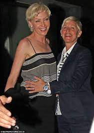 Ellen DeGeneres nuzzles into wife Portia De Rossi as the couple enjoy a  romantic date night Down Under | Daily Mail Online