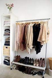 Decorative clothing rack with 2 arms. Classify The Clothes Without Cabinet Design Ideas For Clothes Rack Interior Design Ideas Ofdesign