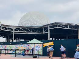After picking up the paint, guests wait in a socially distanced line for the mural. Demolition Continues At Innoventions East West Mickeyblog Com