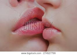 Sensual touch by tous is a amber floral fragrance for women. Lesbian Couple Kiss Lips Passion And Sensual Touch Two Beautiful Sexy Lesbians In Love Lip Care And Beauty Closeup Of Beautiful Young Woman Healthy Lips Closeup Of Women Mouths Kissing Stock