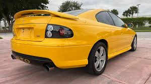 Image result for Yellow 2004 Pontiac