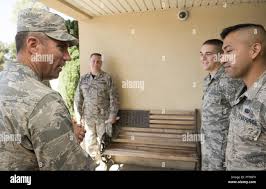 U.S. Air Force Col. Dylan Patterson presents Tech. Sgt. Alex Mix with the  John L. Levitow Award at the NCOA Class 2023-M graduation at Ebbing Air  National Guard Base, Fort Smith, AR,