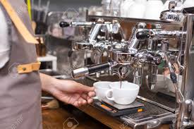 Espresso perfection, requires precision temperature and pressure control, consistently, every time. Hand Of Barista Making Coffee With Coffee Machine In The Coffee Stock Photo Picture And Royalty Free Image Image 97367612