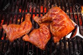 Recipe courtesy of kevin gillespie. Spatula And Three Crispy Bbq Chicken Leg Quarter Roasted On The Hot Charcoal Flaming Grill Closeup Top View Stock Photo Picture And Royalty Free Image Image 55305382