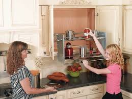 wall cabinet pull down shelving system