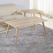 The top is solid acacia wood, with a warm finish. Wooden Rectangle Coffee Table With Iron Legs Light Color Vidi Furniture