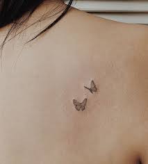 Tiny two butterfly tattoo on wrist. Cute And Small Butterfly Tattoo Tiny Tattoos For Girls Tattoos Girl Tattoos