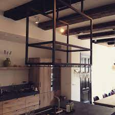 woonhuis amsterdam comodo interieur metalen plafond pannenrek keuken idee